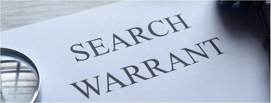 Image of the words Search Warrant